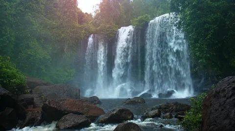 Water Flows over Natural Waterfall in Cambodia with Sound 库存影片 68105925