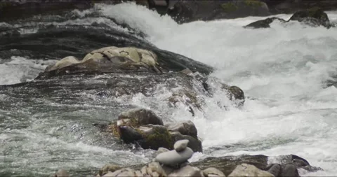 Water Flows over Rapid Rocks Stock Footage 152863503