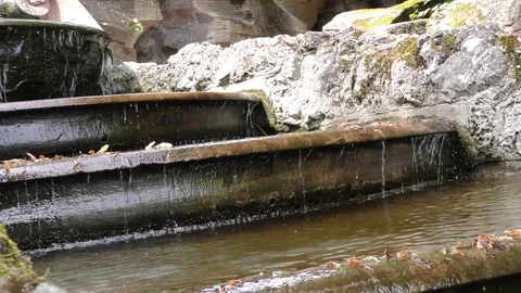 Water flows over the rocks Stock Footage