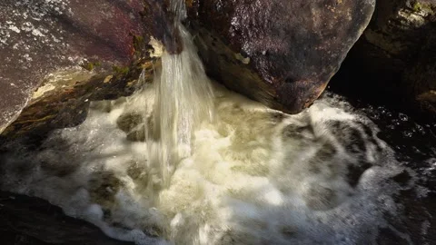 Water flows over rocks, waterfall. Stock Footage 241533403