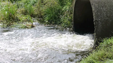 Water flows from a pipe Stock Footage 30378529