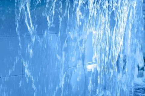 Water flows in the pool. Close-up. Stock Photos