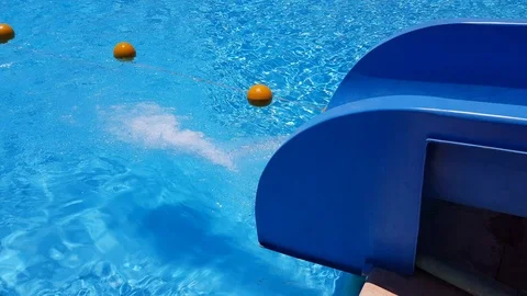 Water flows into the pool with a slide Stock Footage 108050707