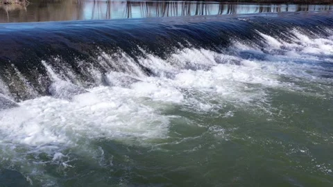 Water flows in the river Stock Footage 261996450