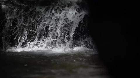 Water flows into the river in slow motion Stock Footage 262404169