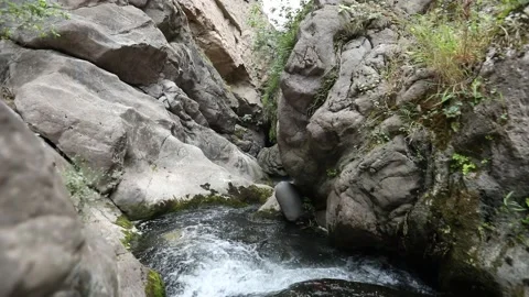 Water flows from a rocky section 3 Stock Footage 333136347