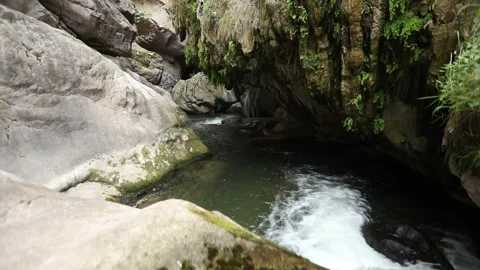 Water flows from a rocky section 7 Stock Footage 333136427