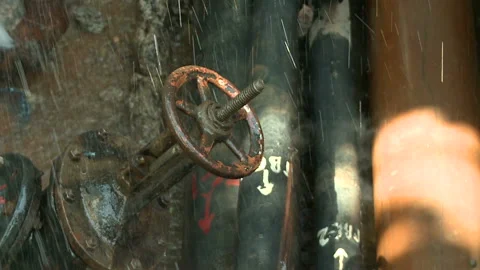 Water flows from a rusty water pipe. Water accident Stock Footage 134831754