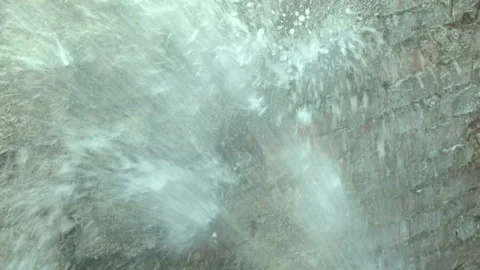 Water flows from a rusty water pipe. Water accident Stock Footage 134929691
