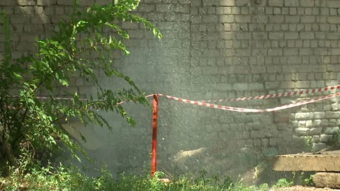 Water flows from a rusty water pipe. Water accident Stock Footage 136652284
