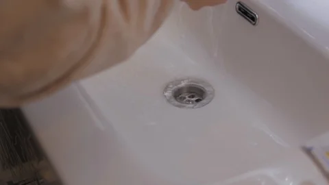 Water Flows Into The Sink Stock Footage 121575048