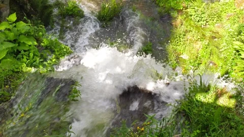 Water flows in slow motion under the historic Devil's Bridge. A blend of Stock Footage 282955589