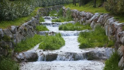 Water flows in a small mountain river Stock Footage 87452012