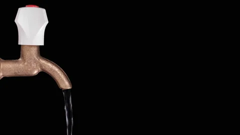 Water flows from the tap on a black background Stock Footage 93426854
