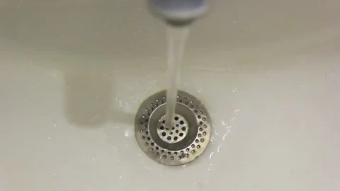 Water flows from the tap close-up Stock Footage 167584249