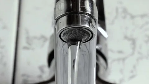 Water flows from the tap Stock Footage 79099424