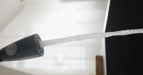 Water flows from the tap in the kitchen. Water pours from water tap. Wastewater Stock Footage 264118039