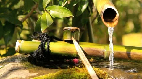 Water flows at temple cleansing station. Stock Footage 10873803