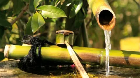Water flows at temple cleansing station. Stock Footage 10873820