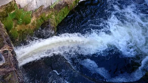 Water flows through 18th century canal lock on Royal Canal in Kildare Ireland Vídeos de archivo 102580704