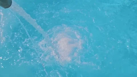 Water Flows Through The Metal Pipe Into Pool Stock Footage 248967115