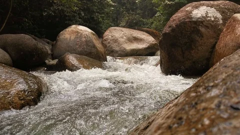A water flows through the rocks Stock Footage 117247831