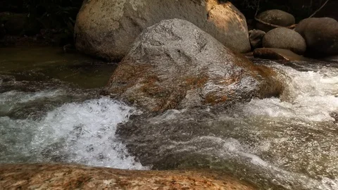 A water flows through the rocks Stock Footage 117247992