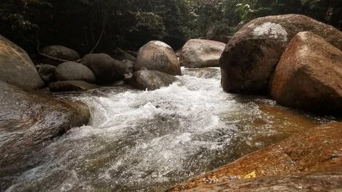 A water flows through the rocks Stock Footage