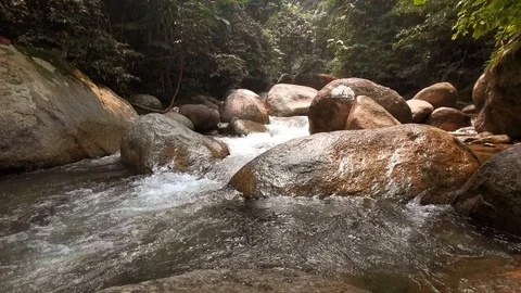 A water flows through the rocks Stock Footage 117248735