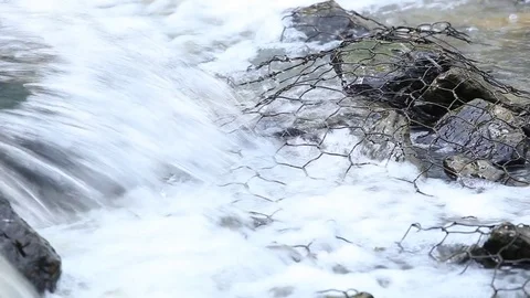 Water flows under pressure at hydroelectric dams. Stock Footage 76506844