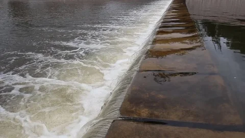 Water flows under pressure at hydroelectric dams. Video stock 76507136