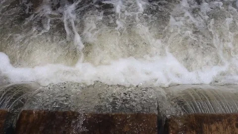 Water flows under pressure at hydroelectric dams. Stock Footage 76507192