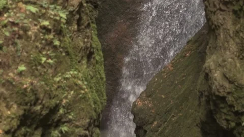 Water flows from a waterfall, slow motion. Stock Footage 230650640