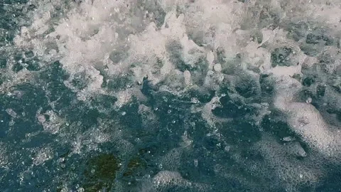 Water flows in a wide waterfall into the pool. Water supply failure, floodi.. Stock Footage 225723439