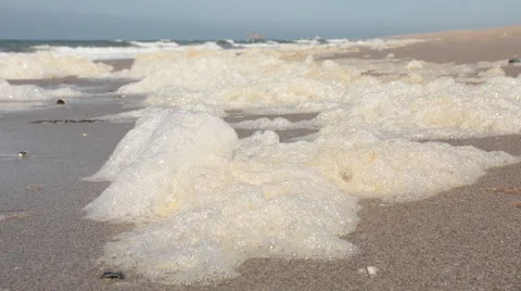 Water foam at the beach Stock Footage 50426918
