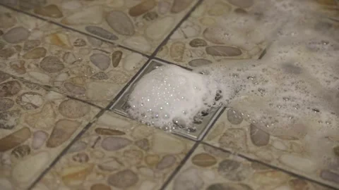 Water with foam Down A Sink Drain Stock Footage 288727849