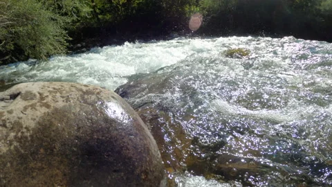 Water forcefully flowing in river, close up. Stock Footage 141188902