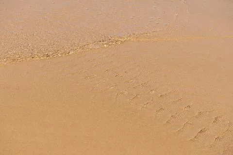 Water forms and effects all over the beach Фото