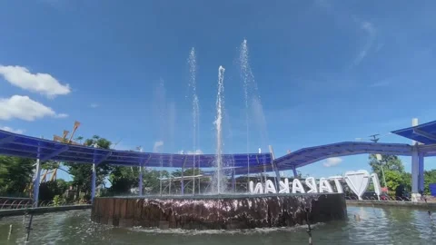 Water fountain spraying high into the air Stock Footage 337889853