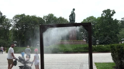 The water frame installed in the park is fun, amusement, game for passers-by. Stock Footage 134330148