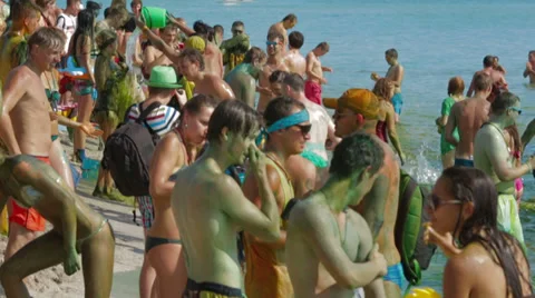 Water games on the beach. Editorial Stock Footage 27458839