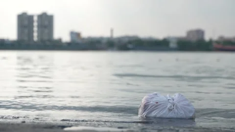 The water of the Ganges River is being polluted due to the dumping of waste. Stock Footage 340776594