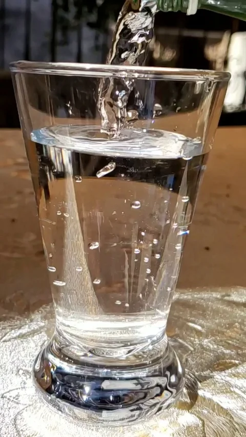 Water glass fill up slow motion with bubble, full hd 960 fps Stock Footage