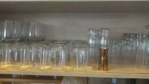Water glasses drying after washing in a tavern Stock Footage 305151753