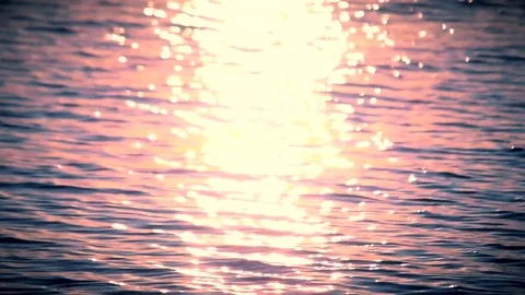 Water glittering in sunlight with sun path on purple and blue water Stock Footage 71167826