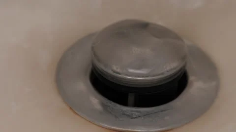 Water Going Down The Drain - Macro Stock Footage 148442384