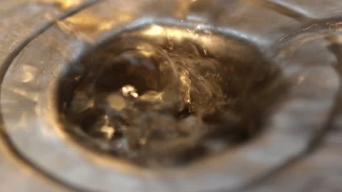 Water going down a plug Stock Footage 145230710