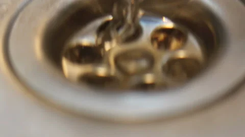 Water going down a plug Stock Footage 145231162