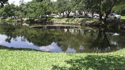 Water going into massive drainage hole Video stock 76479998