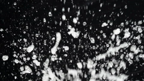 Water gushes on a black background. Flies from a garden hose. Freshness. Recorde Stock Footage 125433019
